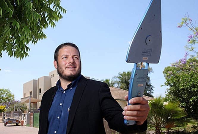 Liran Raz Steinkritser — Senior Radiation Engineer, Razore Engineering — photographed with field measurement equipment
